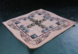 FIDCHELL, a Celtic board game version CÚ CHULAINN with a leather board