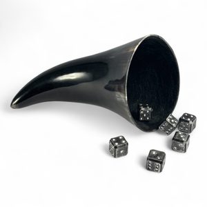 SIX FORGED DICE and a horn cup