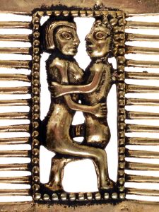 Medieval comb with lovers, bronze