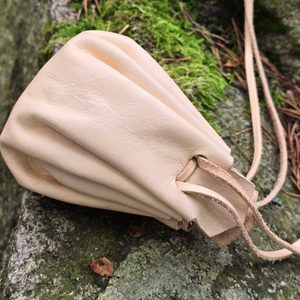 Folding pouch for bushcraft and history
