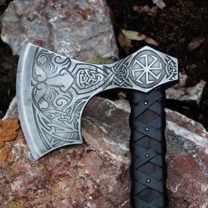 Axe of Perun, etched with leather