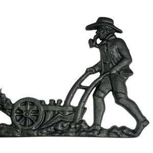 Laboureur et chevaux, décor d'écurie, fonte