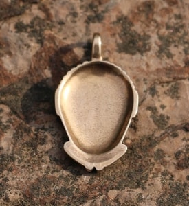 CELTIC HEAD, bronze pendant