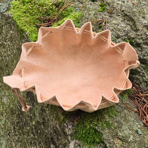 Folding pouch for bushcraft and history