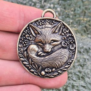 Sleeping fox, pendant, zinc, antique brass