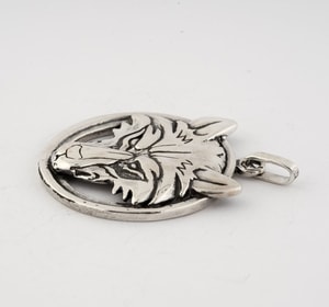 Wolf's head in a ring, sterling silver pendant