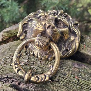 Lion, historical knocker - brass
