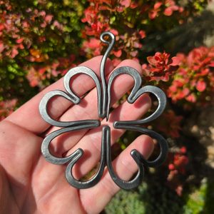 Four-leaf clover for luck, forged