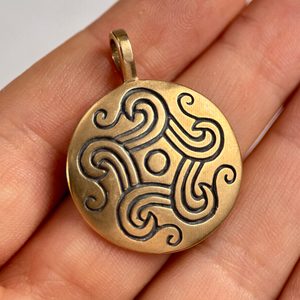 BRONZE AGE SUN, bronze pendant