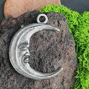 CRESCENT MOON with face, amulet, zinc