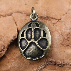 WOLF TRACK, pendant, zinc, ant. brass