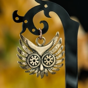 OWL HEAD, pendant, bronze
