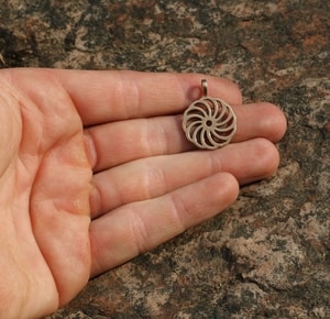 SUN SYMBOL IV, bronze pendant