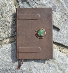 Bookbinding in leather, with semi-precious stone
