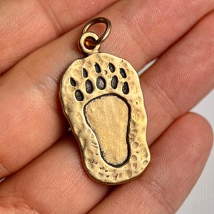 Bear Print, bronze pendant