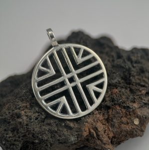 SUN SYMBOL, Hallstatt culture, silver pendant