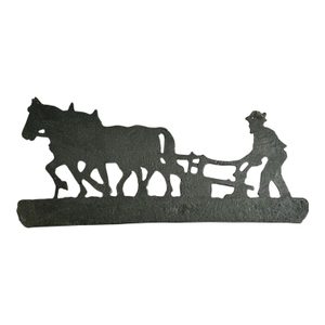 Ploughman and horses, barn decoration, cast iron