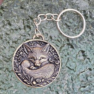 Sleeping fox, keychain, zinc, old brass
