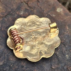 Broche rose mérovingienne, bronze
