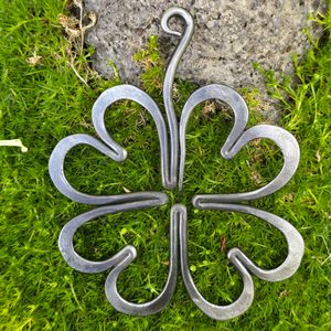 Four-leaf clover for luck, forged
