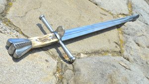 MEDIEVAL FALCHION WITH AN ANTLER HANDLE - FALCHIONS, SCOTLAND, OTHER SWORDS{% if kategorie.adresa_nazvy[0] != zbozi.kategorie.nazev %} - WEAPONS - SWORDS, AXES, KNIVES{% endif %}