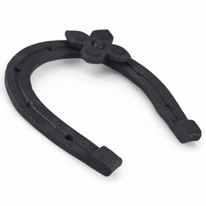 Forged horseshoe with four-leaf clover