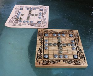 FIDCHELL, a Celtic board game version CÚ CHULAINN with a leather board