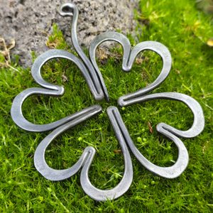 Four-leaf clover for luck, forged
