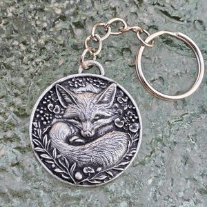 Sleeping fox, keychain, zinc