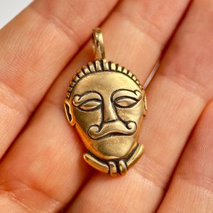 CELTIC HEAD, bronze pendant
