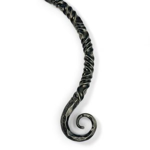 TWISTING IRON TORC