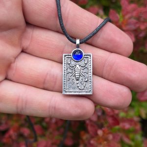 Praetorian Guard scorpion pendant, blue