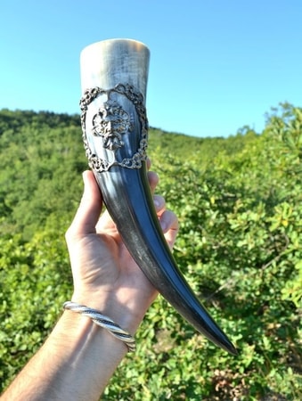 DRINKING HORN WITH A GREEN MAN