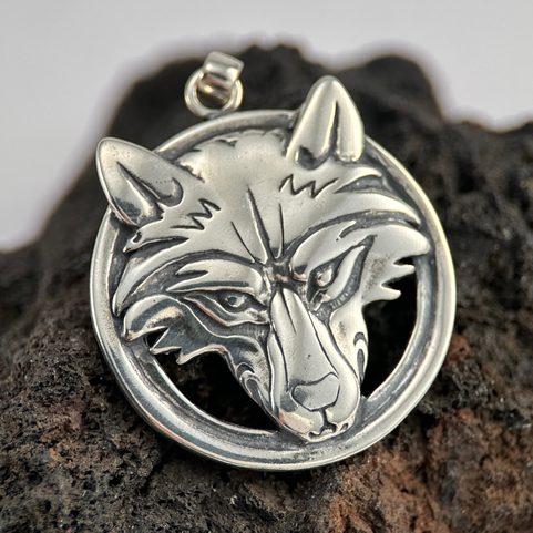 WOLF'S HEAD IN A RING, STERLING SILVER PENDANT