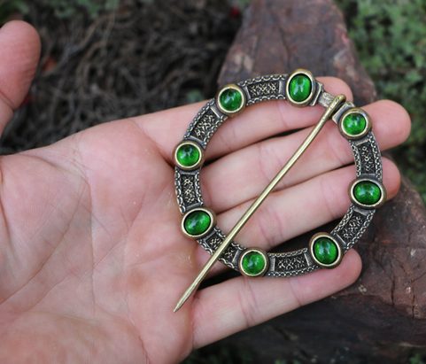 NORICA, LARGE MEDIEVAL CLOAK BROOCH WITH GLASS