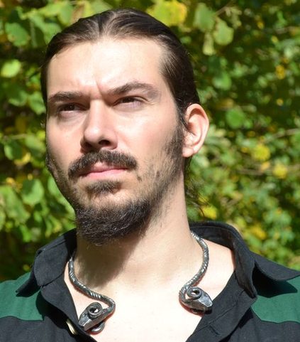 RAM'S HEAD, HAND-FORGED IRON CELTIC TORQUES