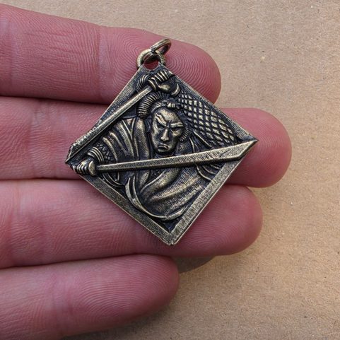 MIYAMOTO MUSASHI, PENDANT, ANTIQUE BRASS