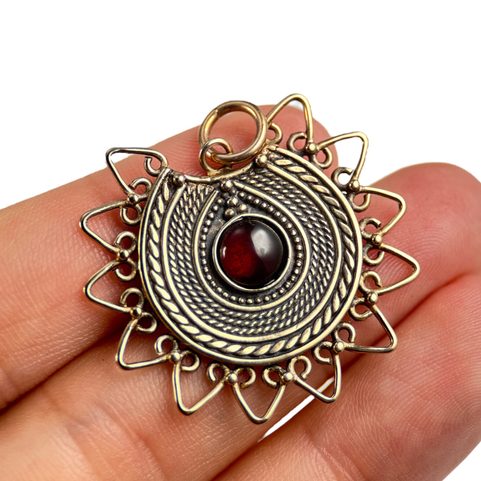 LADA, DARK AGE JEWEL, THE 9TH CENTURY, BRONZE AND GEMSTONE