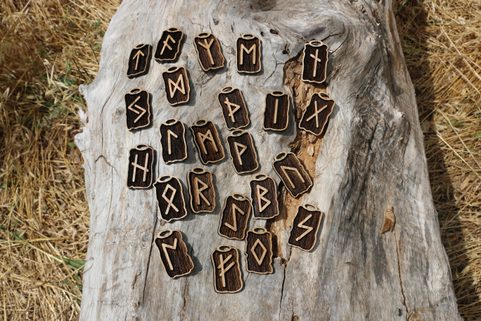 WOODEN RUNES SET - FUTHARK, 24 PIECES OF PENDANTS AND POUCH