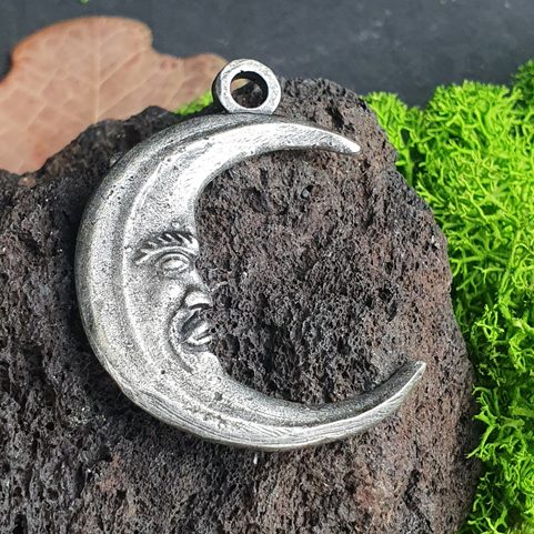 CRESCENT MOON WITH FACE, AMULET, ZINC