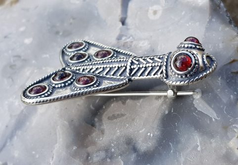 MEROVINGIAN SILVER AND GARNET CICADA BROOCH, 5TH CENTURY