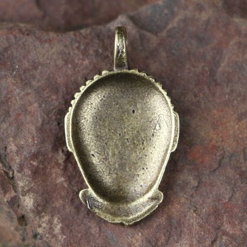 CELTIC HEAD, MSECKE ZEHROVICE, BOHEMIA, ZINC PENDANT, ANTIQUE BRASS