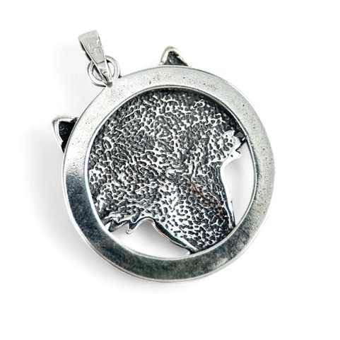 WOLF'S HEAD IN A RING, STERLING SILVER PENDANT