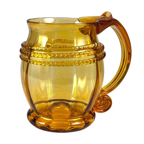 HISTORICAL PINT GLASS, AMBER