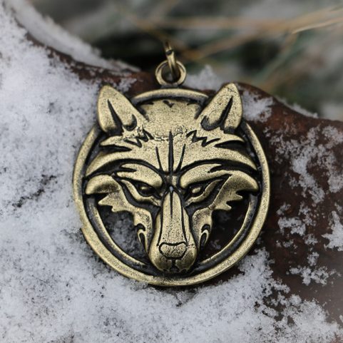 WOLF - WOLF'S HEAD IN A CIRCLE, AMULET ZINC OLD BRASS