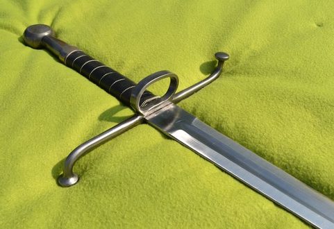 LONG HAND AND A HALF SWORD WITH A RING GUARD