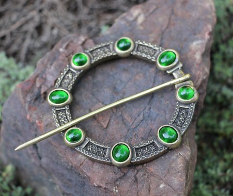 NORICA, LARGE MEDIEVAL CLOAK BROOCH WITH GLASS