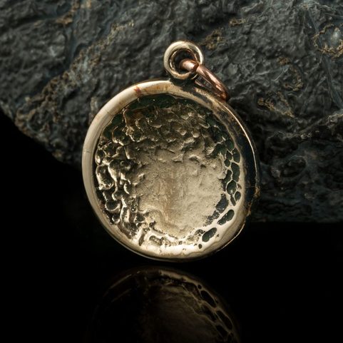 CAT TRACK, PENDANT, BRONZE