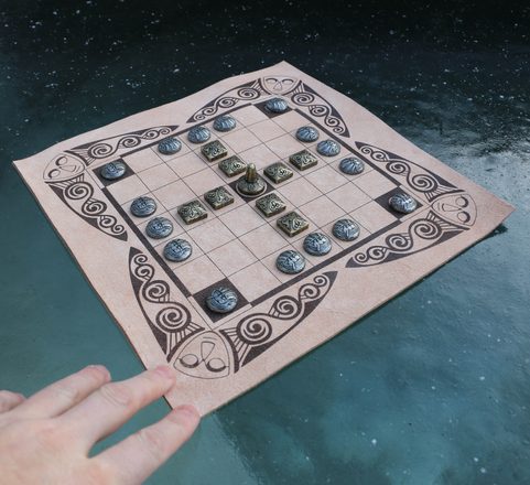 FIDCHELL, A CELTIC BOARD GAME VERSION CÚ CHULAINN WITH A LEATHER BOARD