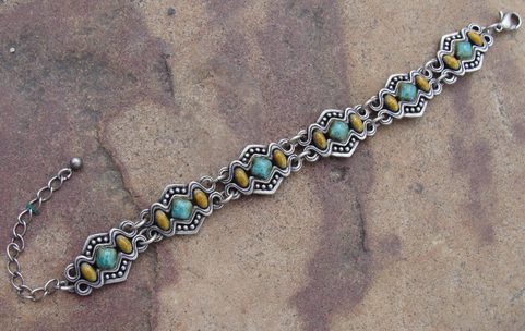 BRACELET, GREEN AND GOLD ENAMEL